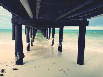 View of pier on beach