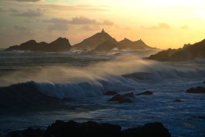 Scenic view of sea against sky during sunset