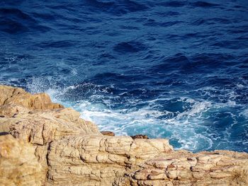 High angle view of rocks on beach