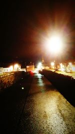 Illuminated street light at night