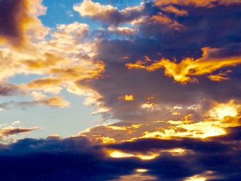 Low angle view of clouds in sky during sunset
