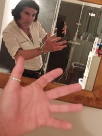 Midsection of woman playing at home