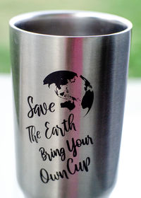 Close-up of text on coffee cup