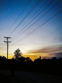 Electricity pylon at sunset