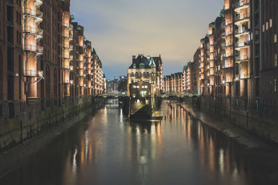 View of illuminated buildings at night