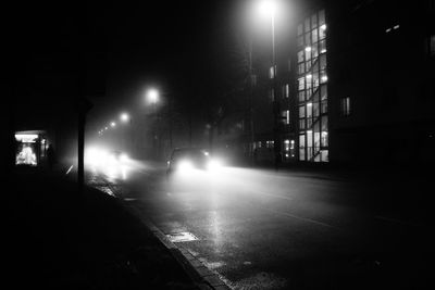 Illuminated street light at night