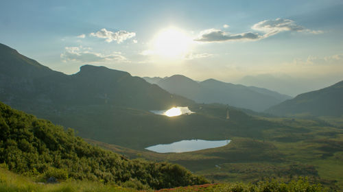 Scenic view of mountains against sky during sunset