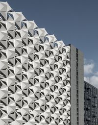 Low angle view of modern building against sky