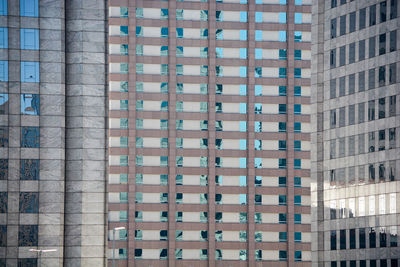 Low angle view of modern buildings in city