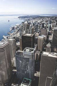 High angle view of buildings in city against sky