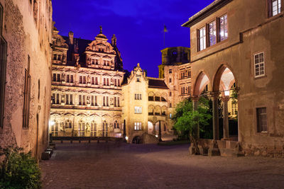 Buildings in city at night