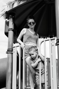 Mother with son standing in gazebo