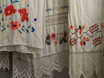Close-up of flower hanging on bed