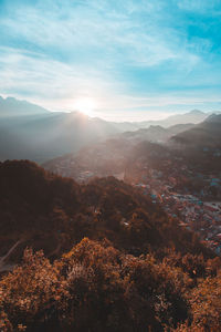 Aerial view of landscape and mountains against sky