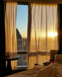 Sunlight through window in hotel room