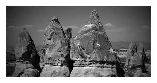 Panoramic view of rocks against sky