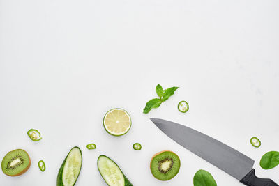 Directly above shot of food on white background