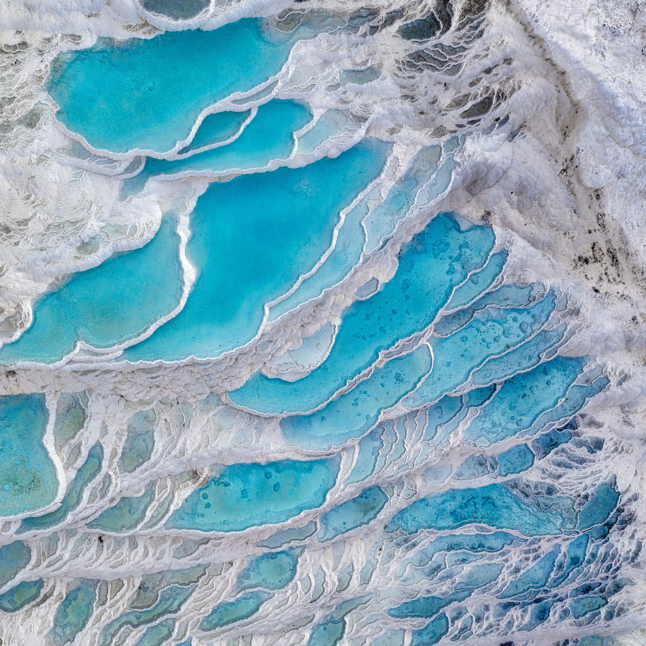 FULL FRAME SHOT OF BLUE WATER ON LAND