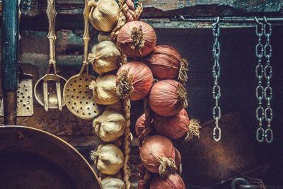 Onions and garlic hanging in kitchen