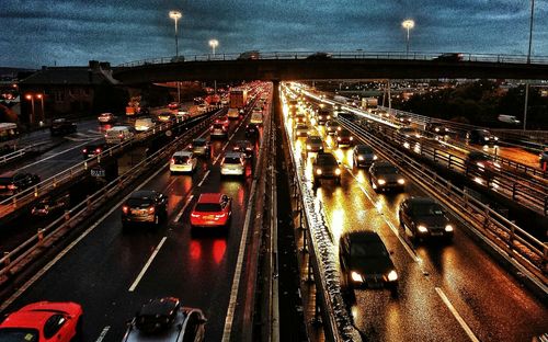 High angle view of cars moving on road at night