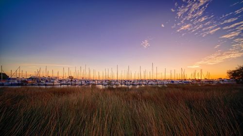 Scenic view of land against sky during sunset