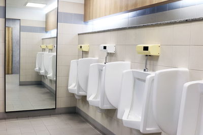 Urinals in public restroom