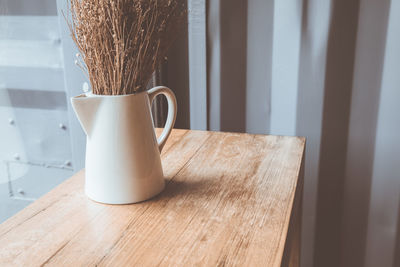 Close-up of coffee on table at home