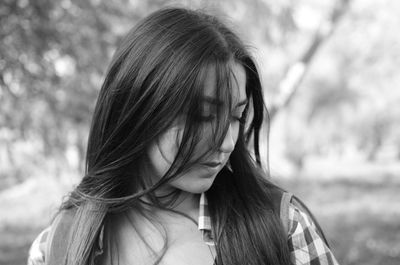 Close-up of woman standing at park