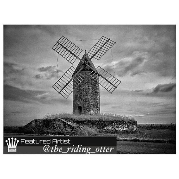 transfer print, wind power, alternative energy, auto post production filter, environmental conservation, windmill, wind turbine, renewable energy, sky, fuel and power generation, traditional windmill, built structure, field, landscape, cloud - sky, architecture, rural scene, technology, low angle view, cloud