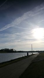 View of river against cloudy sky