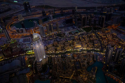 High angle view of city buildings at night