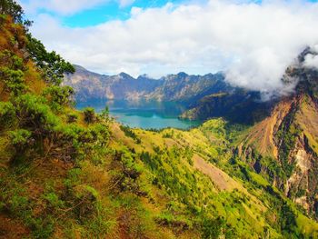 Scenic view of segara anak lake and active volcano