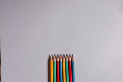 Colorful pencils on white background