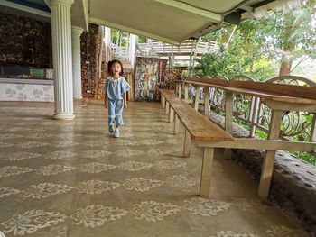 Full length of boy standing in park