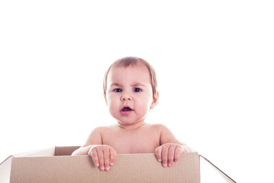 Portrait of boy against white background