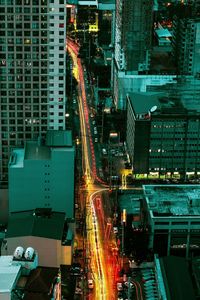 High angle view of illuminated cityscape at night