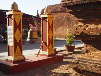 View of temple against building