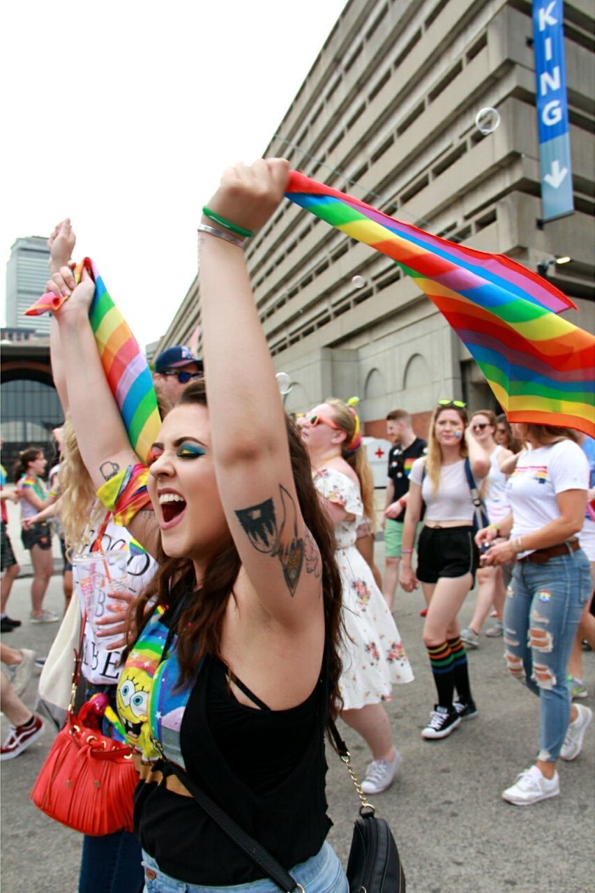 group of people, young adult, happiness, adult, young women, emotion, women, crowd, smiling, arts culture and entertainment, enjoyment, fun, human body part, cheerful, city, standing, event, body part, human arm, festival, human limb, arms raised, excitement, positive emotion