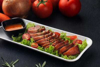 High angle view of vegetables in plate on table