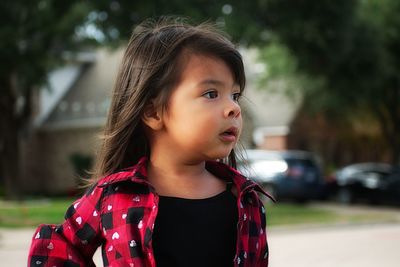 Toddler in plaid shirt