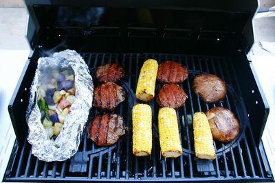 High angle view of food cooking on barbeque grill