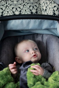 Portrait of cute baby girl sitting