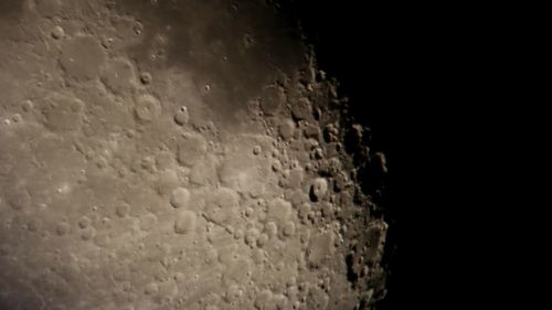 Close-up of water against black background