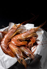 High angle view of meat in container on table
