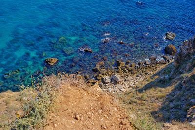 High angle view of rocks on beach