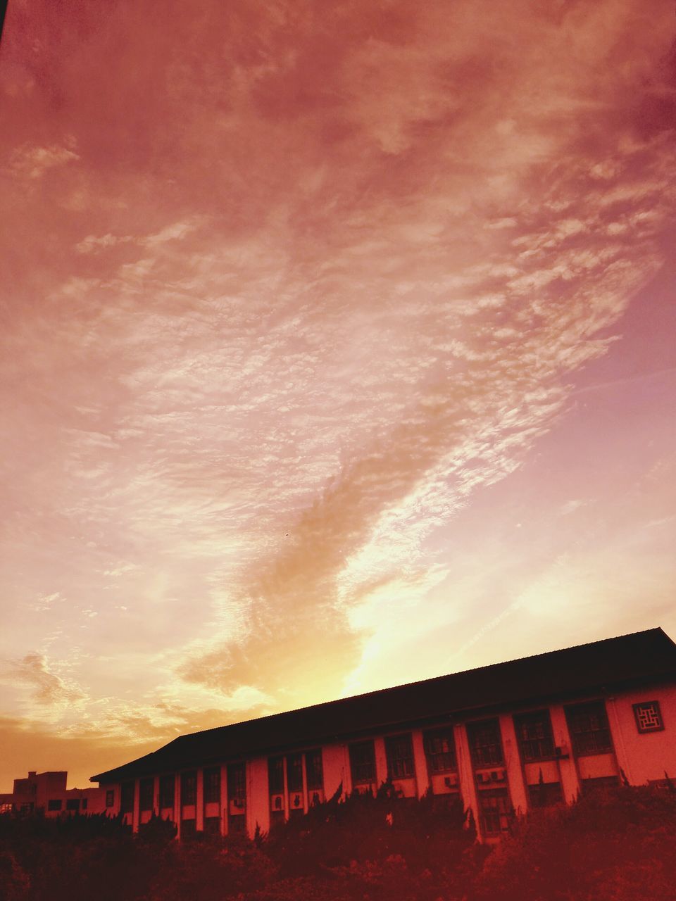 sky, cloud - sky, sunset, low angle view, architecture, built structure, building exterior, cloudy, red, cloud, orange color, outdoors, weather, no people, overcast, silhouette, nature, dramatic sky, text, house