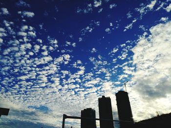 Low angle view of skyscrapers against sky