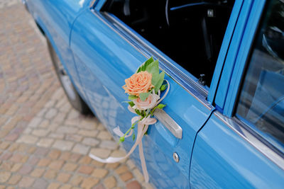 Close-up of car on street