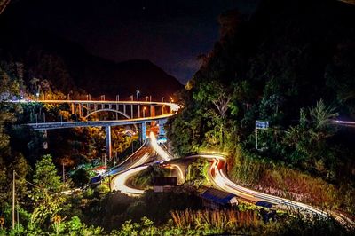 Light trails on bridge at night