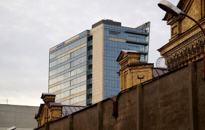 Low angle view of buildings against sky